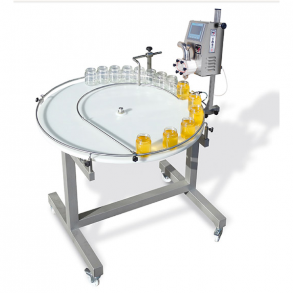 DOSATRICE SMART 2 su tavolo rotante motorizzato Ø 1000 mm - LEGA